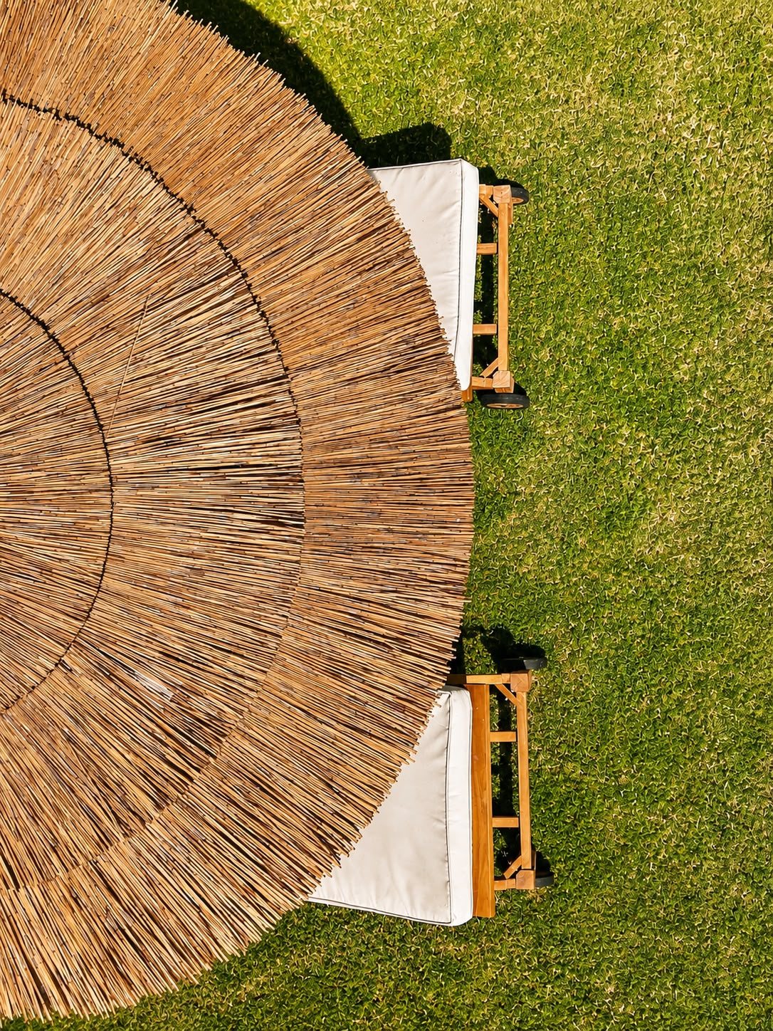 A straw umbrella seen from above